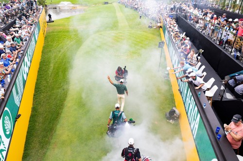 FILE - Charl Schwartzel, of Southern Guards GC, is introduced at the Lion's Den at the 17th tee during the final round of LIV Golf South Africa at The Club at Steyn City, March 22, 2026 in Midrand, South Africa. (Jon Ferrey/LIV Golf via AP, File)