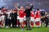Arsenal's Leandro Trossard, left, and manager Mikel Arteta celebrate at the the end of a Champions League semifinal, second leg, soccer match between Arsenal FC and Atletico Madrid in London, Tuesday, May 5, 2026. (John Walton/PA via AP)