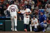 Houston Astros' Braden Shewmake (28) celebrates with Jose Altuve after hitting a home run during the third inning of a baseball game against the Los Angeles Dodgers in Houston, Tuesday, May 5, 2026. (AP Photo/Ashley Landis)