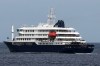 The MV Hondius cruise ship departs the port in Praia, Cape Verde, Wednesday, May 6, 2026. (AP Photo/Misper Apawu)