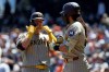 San Diego Padres' Gavin Sheets, left, celebrates with Fernando Tatis Jr., right, after hitting a home run against the San Francisco Giants during the fourth inning of a baseball game in San Francisco, Wednesday, May 6, 2026. (AP Photo/Jed Jacobsohn)