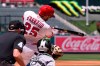 Los Angeles Angels' Travis D'Arnaud, center, hits a three-run home run as Chicago White Sox catcher Drew Romo, right, and home plate umpire Andy Fletcher watch during the second inning of a baseball game Wednesday, May 6, 2026, in Anaheim, Calif. (AP Photo/Mark J. Terrill)