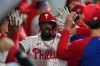 Philadelphia Phillies' Adolis García celebrates his home run off of Athletics pitcher Jeffrey Springs during the sixth inning of a baseball game, Wednesday, May 6, 2026, in Philadelphia. (AP Photo/Matt Rourke)