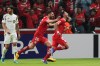 Everardo Lopez of Mexico's Toluca, right, celebrates scoring his side's 2nd goal against of the United States' Los Angeles FC during a CONCACAF Champions Cup second leg semifinal soccer match in Toluca, Mexico, Wednesday, May 6, 2026. (AP Photo/Fernando Llano)