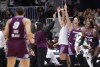 Toronto Tempo guard Kia Nurse (11) cheers from the bench after her teammate made a basket against the Connecticut Sun during first half pre-season WNBA basketball action in Toronto on Wednesday, April 29, 2026. THE CANADIAN PRESS/Nathan Denette