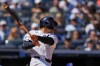 New York Yankees' Trent Grisham follows through on a three-run double during the sixth inning of a baseball game against the Texas Rangers Thursday, May 7, 2026, in New York. (AP Photo/Frank Franklin II)