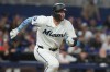 Miami Marlins' Joe Mack runs after hitting a double in the ninth inning of a baseball game against the Baltimore Orioles Thursday, May 7, 2026, in Miami. (AP Photo/Marta Lavandier)