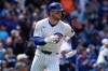 Chicago Cubs' Nico Hoerner runs after hitting a one-run double during the fourth inning of a baseball game against the Cincinnati Reds in Chicago, Thursday, May 7, 2026. (AP Photo/Nam Y. Huh)