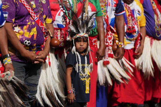 A Maka child takes part in a ceremony on Americas Indigenous Peoples Day on lands they dispute with the government, in Asuncion, Paraguay, Sunday. (Jorge Saenz / The Associated Press)