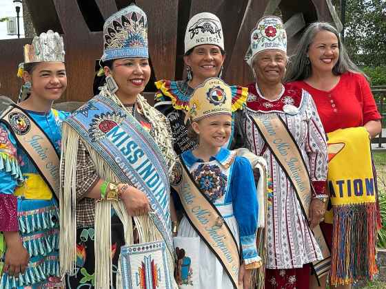 Miss Indian World Dania Wahwasuck, second from left, poses with powwow royalty on the last day of the final Gathering of Nations powwow in Albuquerque, New Mexico, on Saturday, April 25, 2026. (Susan Montoya Bryan / The Associated Press)