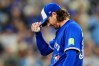 Toronto Blue Jays pitcher Kevin Gausman (34) acknowledges the crowd after making his 2000th career strikeout during fourth inning MLB baseball action against the Tampa Bay Rays, in Toronto, Monday, May 11, 2026. THE CANADIAN PRESS/Frank Gunn