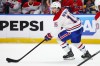 Montreal Canadiens centre Alex Newhook (15) carries the puck during the first period in Game 5 of a second-round NHL hockey Stanley Cup playoff series against the Buffalo Sabres Thursday, May 14, 2026, in Buffalo, N.Y. THE CANADIAN PRESS/AP-Jeffrey T. Barnes