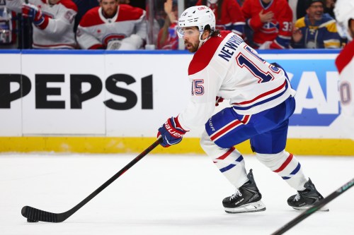 Montreal Canadiens centre Alex Newhook (15) carries the puck during the first period in Game 5 of a second-round NHL hockey Stanley Cup playoff series against the Buffalo Sabres Thursday, May 14, 2026, in Buffalo, N.Y. THE CANADIAN PRESS/AP-Jeffrey T. Barnes