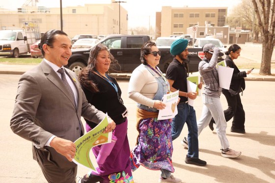 Manitoba Premier Wab Kinew walks with other participants in the Indigenous-led movement that engages men and boys in the commitment to ending violence against women and children.  (Tim Smith / The Brandon Sun)