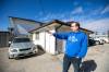 Chris Buffington, executive director of Forward House, shows the spot where the supportive housing organization’s utility trailer was destroyed by an arson-caused fire. (Mikaela MacKenzie / Free Press)