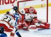 JOHN WOODS / FREE PRESS
                                Manitoba Moose Brad Lambert&rsquo;s shot goes off the mask of Grand Rapids Griffins goaltender Michal Postava during the first period of the Griffins&rsquo; 2-0 win in Game 2 of their Calder Cup playoff series in Winnipeg, Sunday.