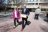 RUTH BONNEVILLE / FREE PRESS
                                Scott Gillingham, with his wife Marla, leaves City Hall on Friday with a box of documents after officially registering for the civic election in October.