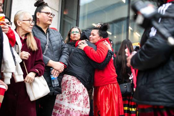 Melissa Roussin, Mackaylah Gerard-Roussin’s mother, hugs family outside of the law courts on Tuesday. (Mikaela MacKenzie / Free Press)