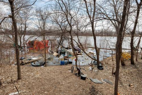 Remains of an encampment on the Red River that runs along Waterfront Drive as seen in April. (Mike Deal / Free Press files)