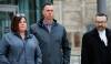Jonathan Kiazyk (centre) leaves the law courts with his lawyer Mike Cook (right) Monday. (Free Press files)