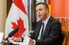 MIKE DEAL / FREE PRESS FILES
                                Finance Minister Adrien Sala: &ldquo;We&rsquo;re going to reduce the cost of your grocery bill on Canada Day &mdash; that is if the PCs let us pass the bill.&rdquo;