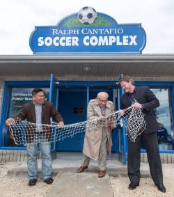 MIKE DEAL / FREE PRESS
                                Cantafio &mdash; flanked by then city Coun. Mike Pagtakhan (left) and Matthew Duffy of the 
Winnipeg Soccer Federation &mdash; cuts a soccer net on June 12, 2016, to officially change the name of the Winnipeg Waverley Soccer Complex to the Ralph Cantafio Soccer Complex.