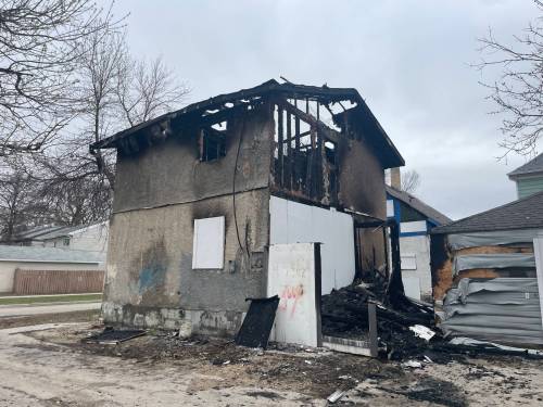 Fire damaged a house at 274 Powers St. on Tuesday. (Ruth Bonneville / Free Press)