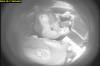 MANITOBA COURTS A hidden camera shows Matthew Kadyniuk, driving, and Elston Bostock counting and splitting money obtained from a backpack used in a staged robbery call.