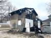 Ruth Bonneville / Free Press
                                The remnants of a fire in a vacant, two-storey house and adjacent garage at 274 Powers St., Tuesday. One of several blazes that ripped through vacant homes so far this week.
