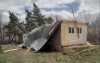 SUPPLIED
                                Darren Charron&rsquo;s roof of his mobile home was sheared off and scattered into the fields around his rural property southeast of Russell.