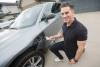 JOHN WOODS / FREE PRESS
                                Kyle Bazylo, owner of Winnipeg EV Charging, is photographed at his home where he has a charging unit and charges his electric car Tuesday, May 19, 2026. Statistics Canada numbers show that MB has achieved record sales of electric cars. reporter: Malak