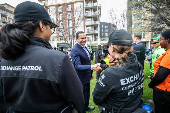 Premier Wab Kinew shakes hands with Exchange patrol workers Thursday's announcement. (Mikaela MacKenzie / Free Press)
