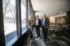 MIKAELA MACKENZIE / FREE PRESS
Robert Olson, CEO of the Manitoba Centennial Centre (left), Michelle Bernier, and David Pensato, executive director of the Exchange District BIZ, in the space which will become a new restaurant area at the Centennial Concert Hall on Friday, May 22, 2026.