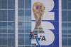 JULIO CORTEZ / THE ASSOCIATED PRESS
                                A worker installs signage on the glass of AT&T Stadium, which will be named Dallas Stadium during the 2026 FIFA World Cup, as preparations continue at the venue ahead of the soccer tournament.