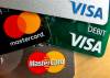 FILE - In this Feb. 20, 2019, file photo, credit cards are displayed in Zelienople, Pa. U.S. consumer borrowing rose in June after three months of declines but the key category of credit card debt extended its decline. (Keith Srakocic / The Associated Press files)
