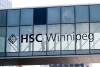 JOHN WOODS / FREE PRESS 
                                An object reportedly struck and broke a pane of glass in a nearby skywalk during helicopter operations Sunday.