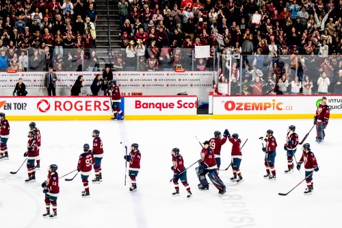 Montreal Victoire teammates celebrate after Montreal Victoire's Maggie Flaherty (91) scored against Ottawa Charge during overtime PWHL playoff hockey action in Laval, Que., on Saturday, May 16, 2026. THE CANADIAN PRESS/Christopher Katsarov