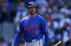 New York Mets' Tommy Pham returns to the dugout after striking out during the ninth inning of a baseball game against the Chicago Cubs, Saturday, April 18, 2026, in Chicago. (AP Photo/Erin Hooley)