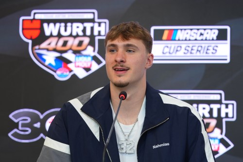 Dallas Mavericks forward Cooper Flagg answers a question before acting as honorary pace car driver for a NASCAR Cup Series auto race at Texas Motor Speedway in Fort Worth, Texas, Sunday, May 3, 2026. (AP Photo/LM Otero)