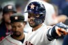 Houston Astros' Carlos Correa (1) celebrates his home run with teammates in the dugout during the sixth inning of a baseball game against the New York Yankees, Saturday, April 25, 2026, in Houston. (AP Photo/Karen Warren)