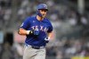 Texas Rangers' Corey Seager runs the bases after hitting a home run during the first inning of a baseball game against the New York Yankees Wednesday, May 6, 2026, in New York. (AP Photo/Frank Franklin II)