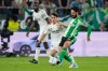 Betis' Isco passes the ball in front of Real Madrid's Manuel Ángel during a La Liga soccer match between Real Betis and Real Madrid in Seville, Spain, Friday, April 24, 2026. (AP Photo/Jose Breton)