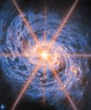 This image provided by NASA/ESA/Webb from the NASA/ESA/CSA James Webb Space Telescope shows Messier 77 (M77), a barred spiral galaxy famous and appreciated among astronomers for its combination of relative proximity and spectacular features to study. (NASA via AP)