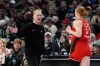 FILE - Portland Fire head coach Alex Sarama greets Chloe Bibby (55) during the first half of a WNBA preseason basketball game against the Los Angeles Sparks, May 3, 2026, in Portland, Ore. (AP Photo/Jenny Kane, File)