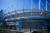 A pedestrian walks outside B.C. Place stadium as preparations continue for the FIFA World Cup, in Vancouver, on Monday, May 4, 2026. THE CANADIAN PRESS/Darryl Dyck