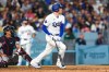 Los Angeles Dodgers' Freddie Freeman watches his home run during the sixth inning of a baseball game against the Atlanta Braves, Friday, May 8, 2026, in Los Angeles. (AP Photo/Jessie Alcheh)