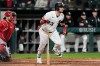 Chicago White Sox's Andrew Benintendi runs after hitting a two-run double during the seventh inning of a baseball game against the Los Angeles Angels in Chicago, Monday, April 27, 2026. (AP Photo/Nam Y. Huh)
