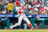 Philadelphia Phillies' Alec Bohm hits a solo home run during the third inning of a baseball game against the Colorado Rockies, Saturday, May 9, 2026, in Philadelphia. (AP Photo/Laurence Kesterson)