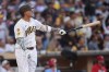 San Diego Padres' Manny Machado watches his home run during the eighth inning of a baseball game against the St. Louis Cardinals Saturday, May 9, 2026, in San Diego. (AP Photo/Gregory Bull)