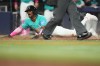 Miami Marlins' Esteury Ruiz scores on a single hit by Christopher Morel during the eighth inning of a baseball game against the Washington Nationals, Sunday, May 10, 2026, in Miami. (AP Photo/Lynne Sladky)
